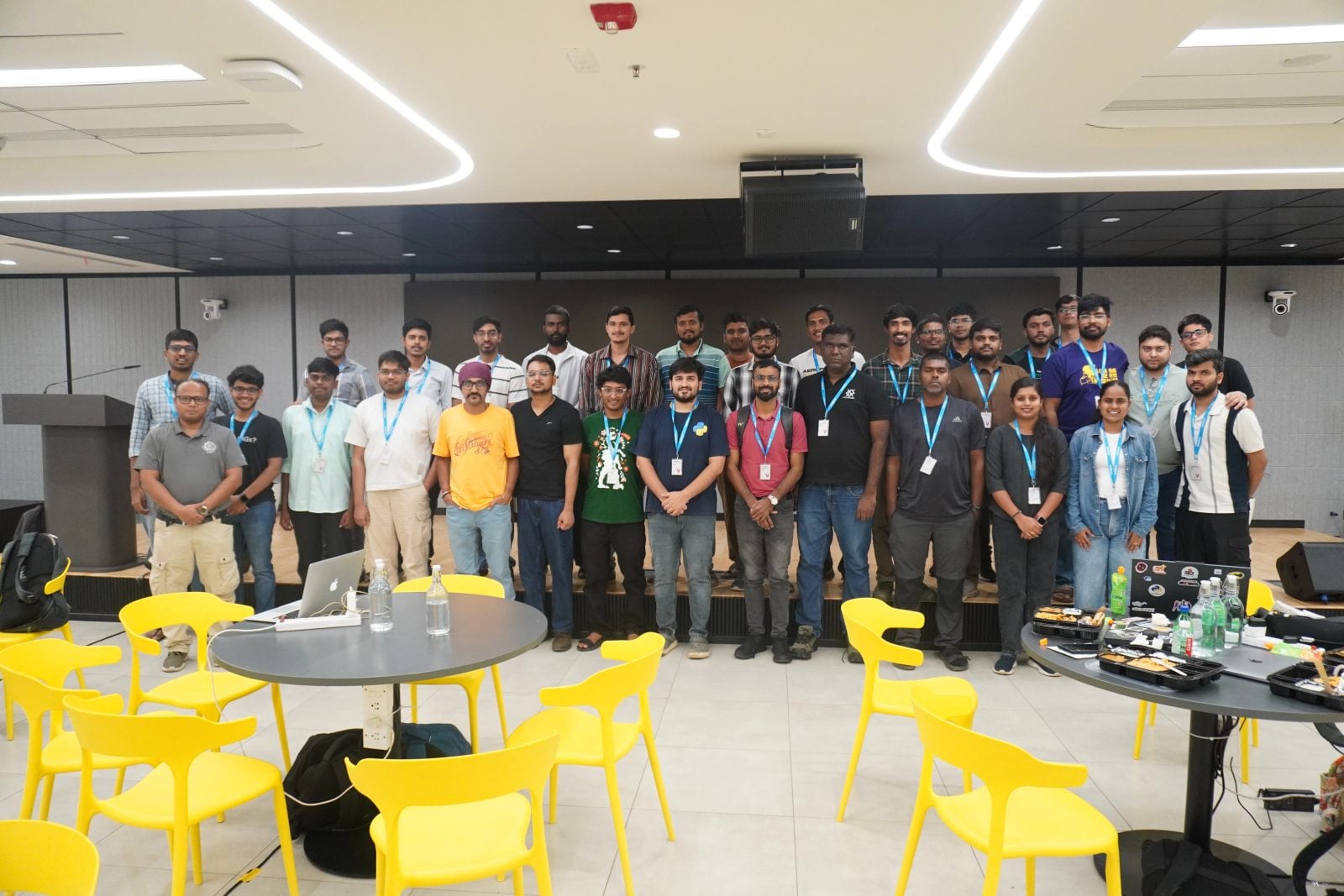 Group photo of maintainers and contributors wearing lanyards at the BangPypers August 2026 devsprint at Amadeus Labs, Bengaluru